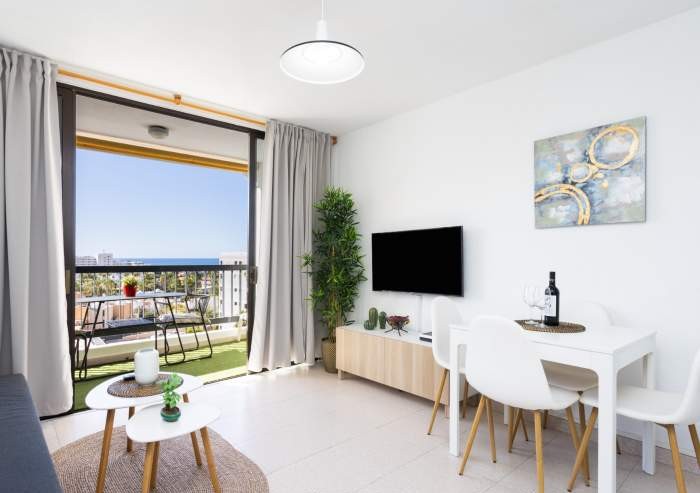 Meerblick Ferienwohnung mit Pool und Meerblick, zentral gelegen in Playa de las Américas – nur wenige Schritte vom Strand